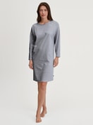 Women model is wearing Long Sleeve Nightdress –100 cm Length made of 100% Cotton in Blue, Patterned from the Cotton Special series by CALIDA, Front view