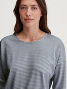 Women model is wearing Long Sleeve Nightdress –100 cm Length made of 100% Cotton in Blue, Patterned from the Cotton Special series by CALIDA, Detail