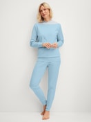 Women model is wearing Pyjama with cuff made of 100% Cotton in Blue, Unicoloured from the Season Special series by CALIDA, Front view