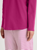Women model is wearing Pyjamas, long made of 100% Cotton in Red, Patterned from the Cotton Special series by CALIDA, Detail