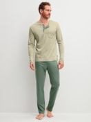 Men model is wearing Pyjamas, long made of Cotton in Green, Unicoloured from the Relax Superlight series by CALIDA, Front view