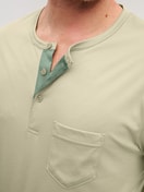Men model is wearing Pyjamas, long made of Cotton in Green, Unicoloured from the Relax Superlight series by CALIDA, Detail