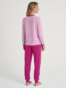 Women model is wearing Pyjama with cuff made of 100% Cotton in Pink, Patterned from the Cotton Special series by CALIDA, Back view