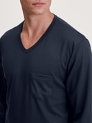 Men model is wearing Pyjamas, long made of 100% Cotton in Blue, Patterned from the Relax Streamline series by CALIDA, Detail