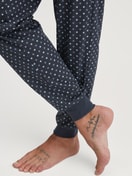 Men model is wearing Pyjama with cuff made of 100% Cotton in Blue, Patterned from the Relax Streamline series by CALIDA, Detail