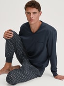 Men model is wearing Pyjama with cuff made of 100% Cotton in Blue, Patterned from the Relax Streamline series by CALIDA, Additional Image