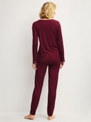 Women model is wearing Pyjamas, long made of Modal in Red, Lace from the Season Special series by CALIDA, Back view