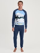 Men model is wearing Pyjama with cuff made of 100% Cotton in Blue, Motif from the Relax Ski Resort series by CALIDA, Front view