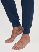 Men model is wearing Pyjama with cuff made of 100% Cotton in Blue, Motif from the Relax Ski Resort series by CALIDA, Detail