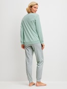 Women model is wearing Pyjama with cuff made of 100% Cotton in Turquoise, Patterned from the Sweet Dreams series by CALIDA, Back view