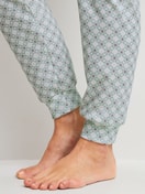 Women model is wearing Pyjama with cuff made of 100% Cotton in Turquoise, Patterned from the Sweet Dreams series by CALIDA, Detail