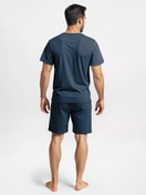 Men model is wearing Short pyjamas made of 100% Cotton in Blue, Striped from the Nightwear Xtra series by CALIDA, Back View