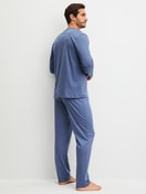 Men model is wearing Pyjamas, long made of 100% Cotton in Blue, Unicoloured from the Relax Choice 1 series by CALIDA, Back view