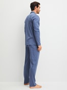 Men model is wearing Pyjamas with buttons made of 100% Cotton in Blue, Unicoloured from the Relax Choice 1 series by CALIDA, Back view