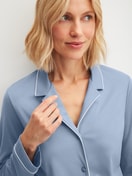 Women model is wearing Button-Up Pyjama made of 100% Cotton in Blue, Unicoloured from the Night Lovers series by CALIDA, Detail
