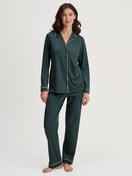 Women model is wearing Button-Up Pyjama made of 100% Cotton in Green, Unicoloured from the Night Lovers series by CALIDA, Front view