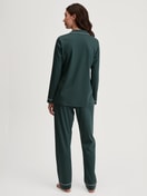 Women model is wearing Button-Up Pyjama made of 100% Cotton in Green, Unicoloured from the Night Lovers series by CALIDA, Back view