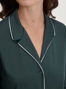 Women model is wearing Button-Up Pyjama made of 100% Cotton in Green, Unicoloured from the Night Lovers series by CALIDA, Detail