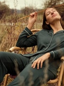 Women model is wearing Button-Up Pyjama made of 100% Cotton in Green, Unicoloured from the Night Lovers series by CALIDA, Additional Image