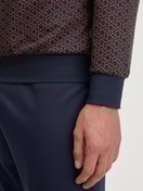 Herren-Model trägt Bündchen-Pyjama aus 100% Baumwolle in Blau, Einfarbig aus Serie Relax Choice 1 von CALIDA, Detail