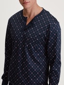 Men model is wearing Pyjama with cuff made of 100% Cotton in Blue, Patterned from the Relax Selected 4 series by CALIDA, Detail