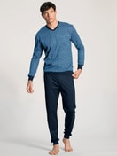 Men model is wearing Pyjama with cuff made of 100% Cotton in Blue, Patterned from the Nightwear Xtra series by CALIDA, Front view