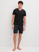 Men model is wearing Short pyjamas made of 100% Cotton in Black, Patterned from the Relax Streamline 2 series by CALIDA, Front view