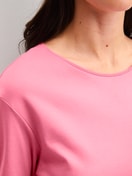 Women model is wearing Pyjamas, long made of 100% Cotton in Pink, Floral from the Autumn Dreams series by CALIDA, Detail