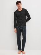 Men model is wearing Pyjamas, long made of 100% Cotton in Black, Patterned from the Relax Streamline 2 series by CALIDA, Front view