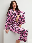 Women model is wearing Button-Up Pyjama made of 100% Cotton in Pink, Floral from the Autumn Dreams series by CALIDA, Additional Image