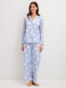 Women model is wearing Button-Up Pyjama made of 100% Cotton in Blue, Patterned from the EDITION 85 series by CALIDA, Front view