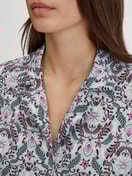 Women model is wearing Button-Up Pyjama made of 100% Cotton in Blue, Patterned from the Autumn Dreams series by CALIDA, Detail