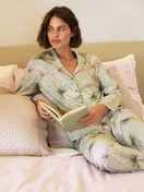 Women model is wearing Button-Up Pyjama made of 100% Cotton in Green, Floral from the Leaf Dreams series by CALIDA, Front view