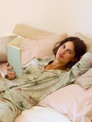 Women model is wearing Button-Up Pyjama made of 100% Cotton in Green, Floral from the Leaf Dreams series by CALIDA, Additional Image