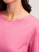 Women model is wearing Pyjama with cuff made of 100% Cotton in Pink, Floral from the Autumn Dreams series by CALIDA, Detail