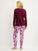Women model is wearing Pyjama with cuff made of Swiss+Cotton in Red, Floral from the Season Special series by CALIDA, Back view