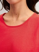 Women model is wearing Pyjamas, long made of 100% Cotton in Red, Patterned from the Fruity Dreams series by CALIDA, Detail