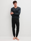 Men model is wearing Pyjama with cuff made of 100% Cotton in Black, Patterned from the Relax Streamline 2 series by CALIDA, Front view