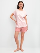 Le mannequin Femme porte le/la Pyjama court en 100% coton de couleur Orange, À motifs, de la série Lovely Nights de CALIDA, Vue de face