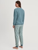 Women model is wearing Pyjama with cuff made of 100% Cotton in Blue, Patterned from the Ornament Nights series by CALIDA, Back view
