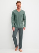 Men model is wearing Pyjamas, long made of 100% Cotton in Green, Patterned from the Cotton Special series by CALIDA, Front view