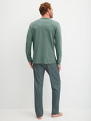 Men model is wearing Pyjamas, long made of 100% Cotton in Green, Patterned from the Cotton Special series by CALIDA, Back view