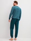 Men model is wearing Pyjama with cuff made of 100% Cotton in Blue, Patterned from the Cotton Special series by CALIDA, Back view