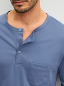 Men model is wearing cuffed pyjamas made of 100% Cotton in Blue, Unicoloured from the Relax Choice 1 series by CALIDA, Detail