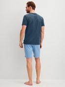 Men model is wearing Short pyjama made of 100% Cotton in Blue, Patterned from the Cotton Special series by CALIDA, Back view