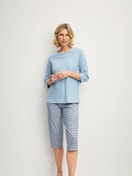 Women model is wearing Capri Pyjama made of 100% Cotton in Grey, Patterned from the Cotton Special series by CALIDA, Front view