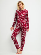 Women model is wearing Pyjamas, long made of 100% Cotton in Red, Patterned from the Cotton Special series by CALIDA, Front view