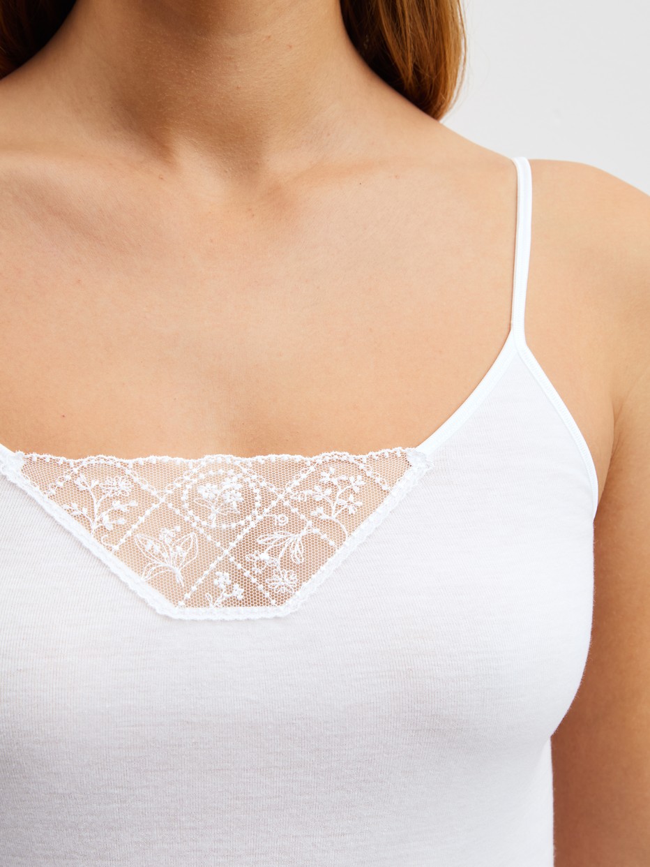 Women model is wearing Spaghetti top made of 100% Cotton in White, Lace from the Cotton Desire series by CALIDA, Detail