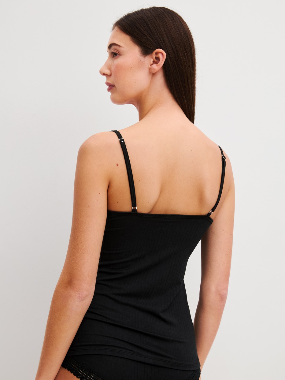Women model is wearing Spaghetti top made of Modal in Black, Unicoloured from the Etude Ajours series by CALIDA, Back view