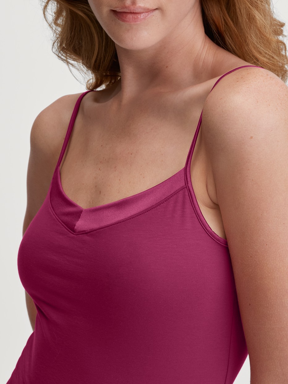Women model is wearing Spaghetti top made of 100% Cotton in Pink, Unicoloured from the Cate series by CALIDA, Detail